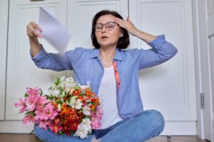 Woman experiencing side effects of menopause